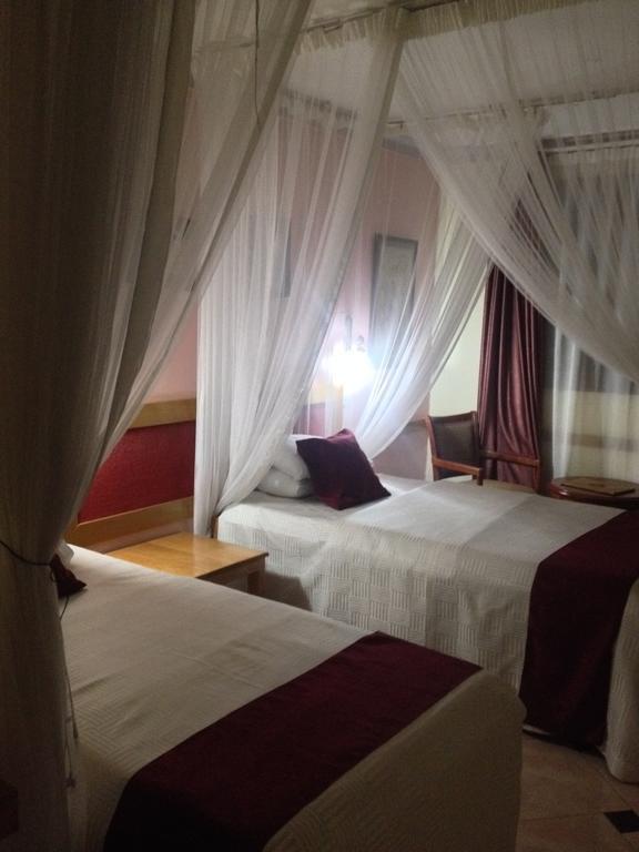 J Residence Motel Entebbe Rom bilde