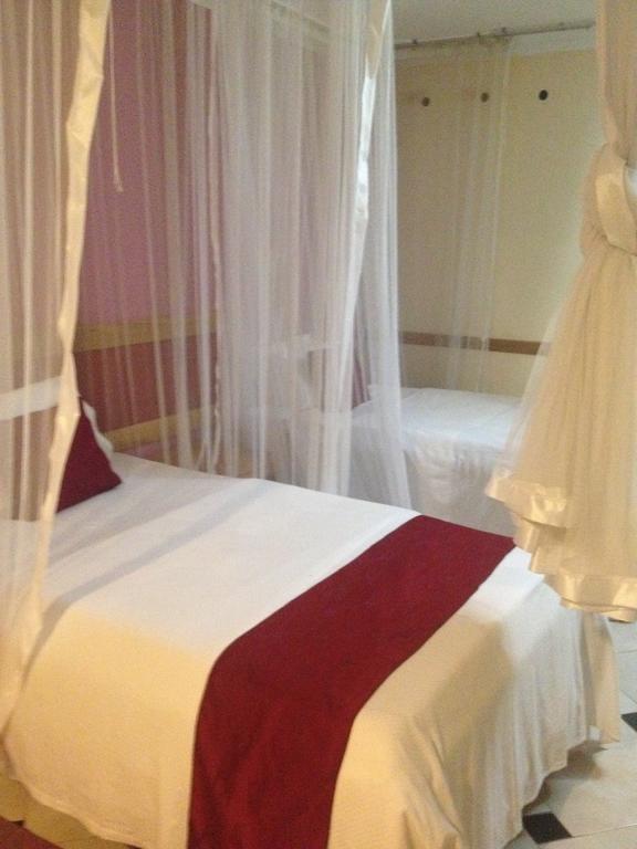 J Residence Motel Entebbe Rom bilde